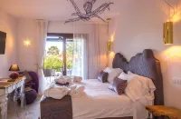 Geco di Giada Exclusive Art Suites Hôtels à : Marinella