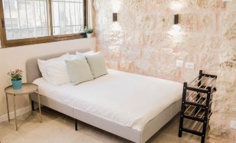 Gabriel Apartments - Stone Suits Jem City Center