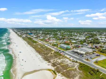 Scenic Balcony and Gated Pool Access - Breathtaking Coastal Haven