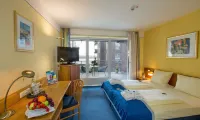 Hotel Rheinpark Rees Отели в г. Хальдерн