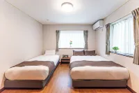 Poka Villa Aoyama Отели рядом с достопримечательностью «Triangle Lawn»