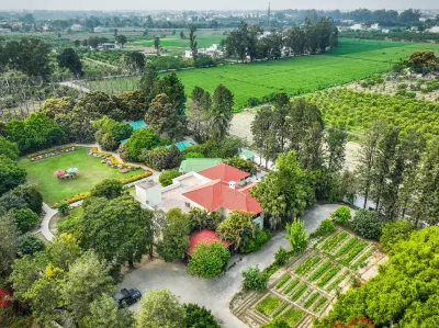 Citrus County, Hoshiarpur, amã Stays & Trails Hotels near Thana Dam - Family Picnic