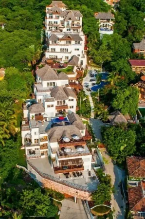 Steps from the beach with private heated pool and incredible views