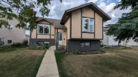 Peaceful and Inviting 4 Bedroom Bilevel House Hotels near The Grow Shop Ltd.