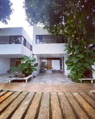 Tizimín retreat: stylish townhouses, natural harmony, modern comforts.