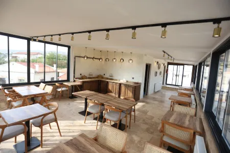 Erdu Cappadocia Stone House Hotel Отели в г. Аванос