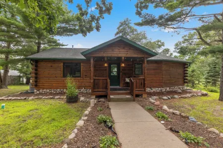 Lakeside Log Cabin w/Firepit, Dock, King Bed, Game Room, Scenic Relaxation