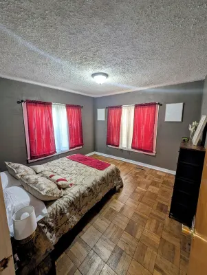 Cozy two-bedroom house with central heat and air. Close to downtown Ark City.