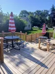 Solar-powered home sleeps 11 near golf courses, hockey & baseball.