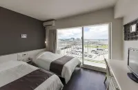 Hotel Gran View Garden Okinawa فنادق في توميغوسوكو