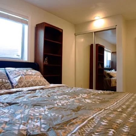 3-bed/2 bath basement apt. in charming Midvale with AC, wifi, laundry & hot tub.