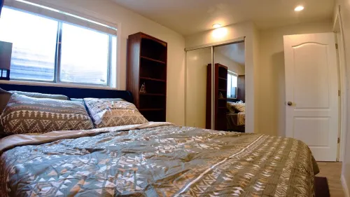 3-bed/2 bath basement apt. in charming Midvale with AC, wifi, laundry & hot tub.