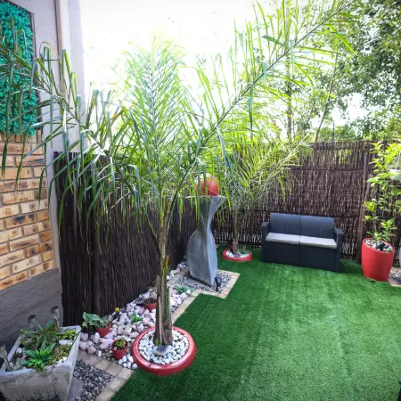 Luxury 2-Bedroom Apartment Near or Tambo with Private Garden & Heated Pool