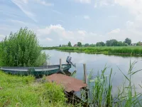 Farmhouse by Lauwers River with Rowing Boat - Apartments