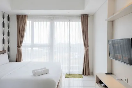 Homey and Comfy Studio Casa de Parco Apartment by Travelio