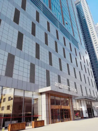 Aiyi Future Serviced Apartment (Shenyang Qingnian Street Maoye Center Branch) Отели рядом с достопримечательностью «Shenyang Science Palace»