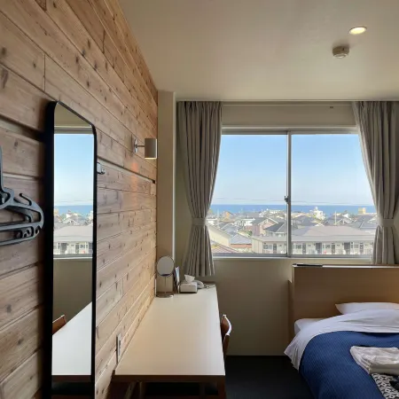 Hitachi Hotel Crane Отели в г. Хитати