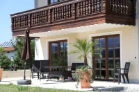 5 star apartment "Sissi" with heated pool & fantastic panorama Hotels in Übersee