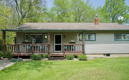 Lakeside living awaits at beautiful Lake Milton, OH with dock across the street