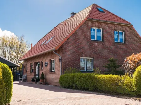 Quiet vacation apartment in Minsen Schillig on the natural beach Отели рядом с достопримечательностью «Ваттенмеер»