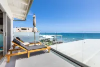 Modern Malibu Road Oceanfront Beach House with AC Hotels in Malibu