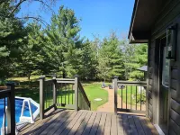 Cabin with hot tub, heated swimming pool and acres of backyard hiking