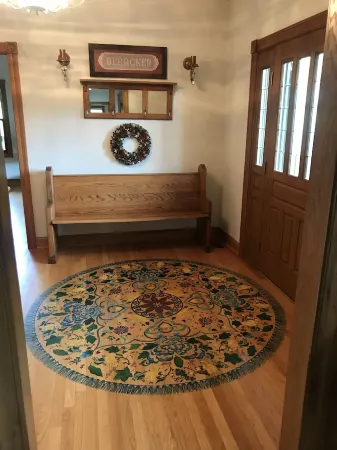 Located on a 12 acre orchard, this large upscale home features stunning views