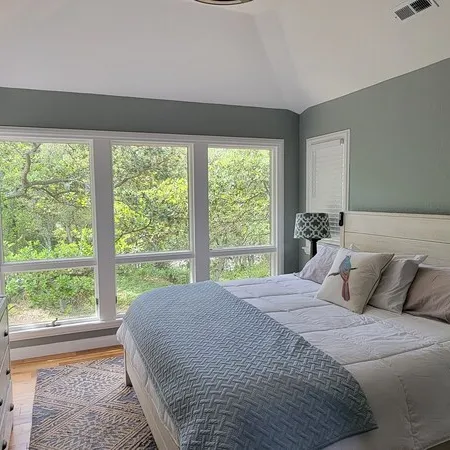 Updated beach house with private pool, hot tub, and community fitness center!