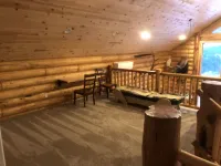 Private Log Cabin with breathtaking views on 15 acres adjacent to forest service