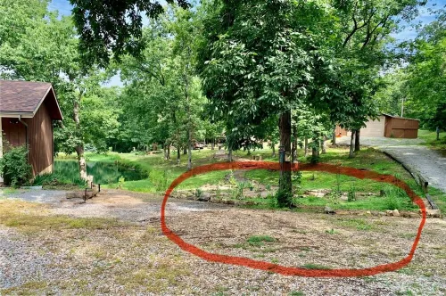 Enjoy Fall Serenity on Our Woodland Retreat with Boat Parking Near Truman Lake Hotels in Henry County