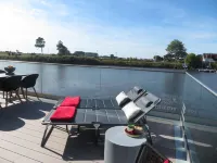Pfahlhaus Perle am Yachthafen Carolinensiel Harlesiel ❤️, Living on the water - 4-Star