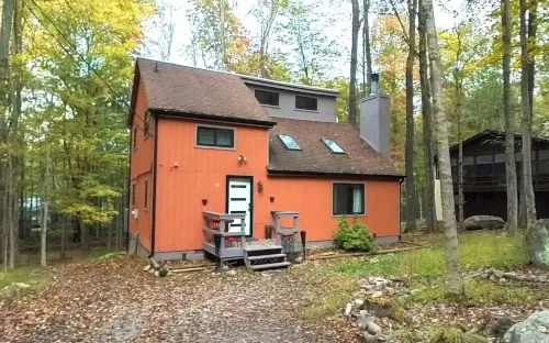 Tranquil 4-bedroom cabin, fireplace, firepit, games, private community