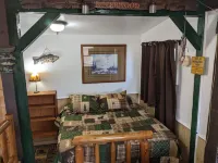 Waterfront Cabin with Hot Tub! Free Kayaks & Canoes, Fishing Boats, & Bicycles!