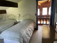 Waterfront Chalet with expansive views of lake & mountains.