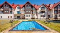 Apartamenty Sun & Snow Lisi Jar - Sezonowy Basen, Blisko plaży, Sauna Hotels in Rozewie