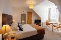 Dunedin Guest House - en bord de mer