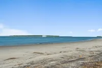 Ocean Front Deck and Mesmerizing Sunsets - Charming Coastal Retreat
