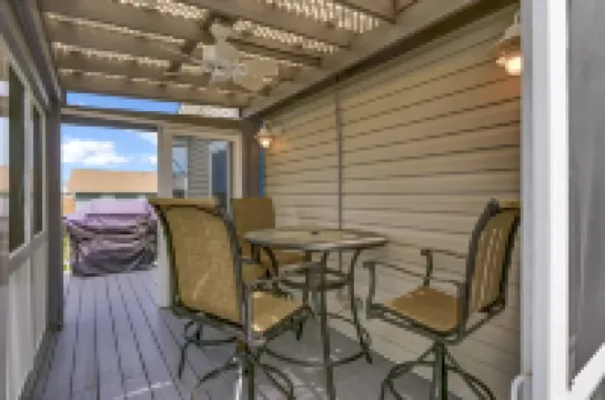 Tranquil Sound Access and Expansive Deck - Charming Coastal Retreat