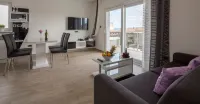 Apartments the Seasons Residence Hotels in Duce