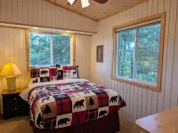 Charming Cabin with Deck and Fireplace - Serene Woodland Escape Hotels in Plum Lake