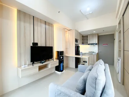 Spacious and Homey 1Br Vasanta Innopark Apartment Отели рядом с достопримечательностью «Bonecom Tricom Mm2100»