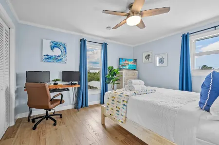 Sunset Sights Waterfront BBQ Fire Pit Dolphins