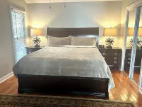 Cozy one level, 2 BR, 2 Bath TH in charming wooded community. Perfect location!
