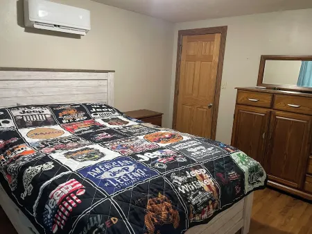 House on 80 acres that connect into the off road park! Extra cabins available.