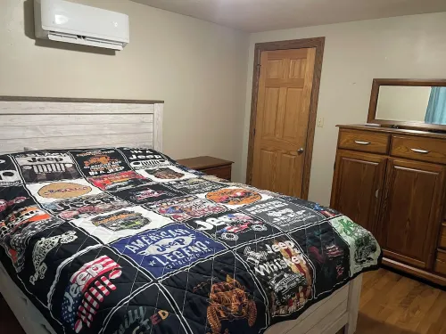 House on 80 acres that connect into the off road park! Extra cabins available.