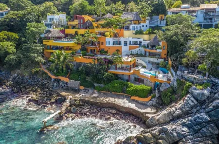 Villa Mandarina's Ocean Front Estate 8-16 Bedrooms Price Listed is for 8 Rooms.