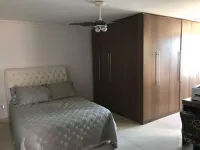 Penthouse with 6 bedrooms, 5 of which are suites, 2 living rooms, swimming pool, barbecue area