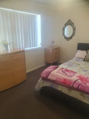 A single room is available in a spacious, well-furnished house.