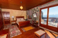 Beachfront, Stone-Built, Beautifully-Appointed, Spacious 5-bedroom Villa. Hotels in Edipsos