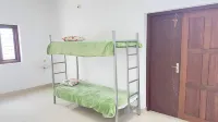 Charming 1-bedroom house in Koyilandy with WiFi and 2 bunk beds 코이랜디 호텔